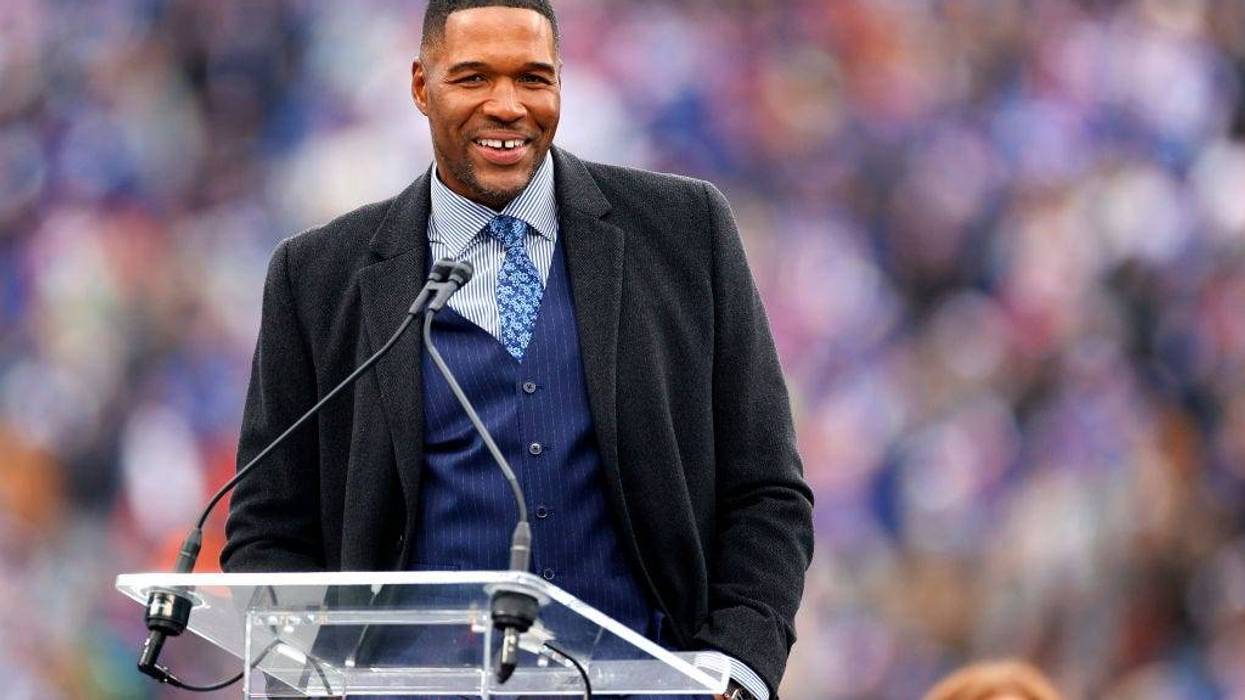 Former New York Giants player Michael Strahan speaks during the ceremony to retire his number at half time of the game between the Philadelphia Eagles and the New York Giants at MetLife Stadium on November 28, 2021 in East Rutherford, New Jersey.