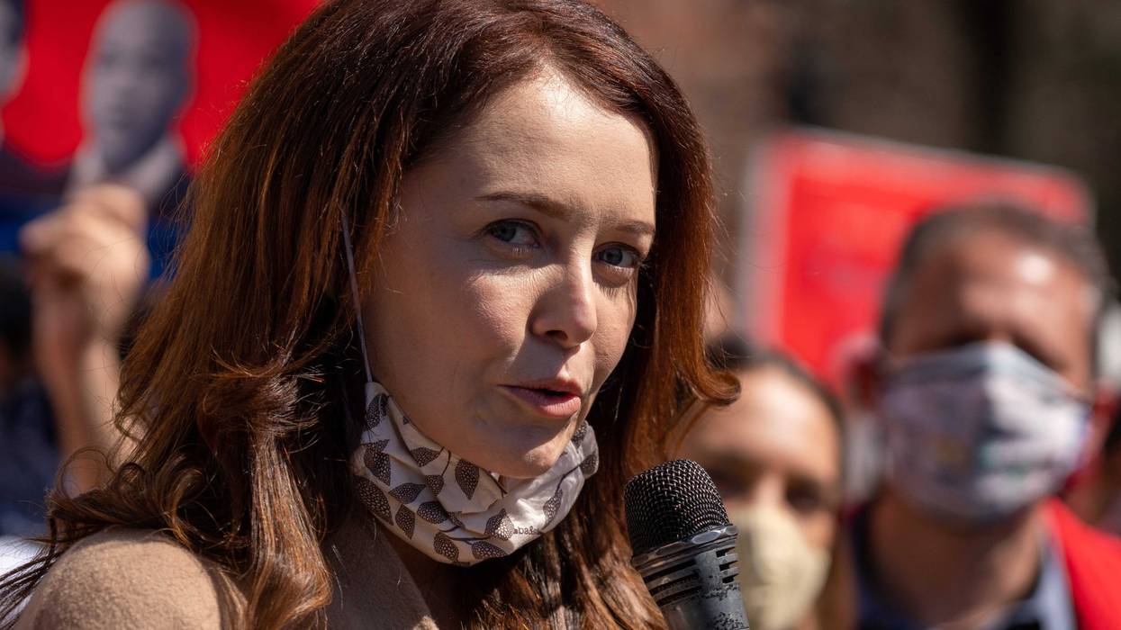 Former New York Governor Andrew Cuomo aide Lindsey Boylan and dozens of protesters gather at Washington Square Park to demand the governors resignation on March 20, 2021 in New York City. The demands for Governor Cuomos resignation are in response to the sexual harassment allegations made by numerous women and a cover-up preventable of coronavirus (COVID-19) deaths in nursing homes.