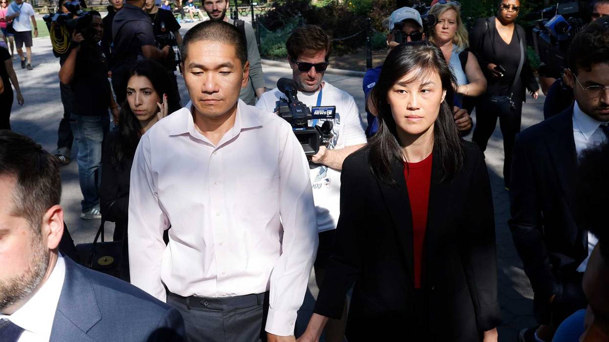 Former New York Governor Kathy Hochul aide Linda Sun, right, and her husband, Christopher Hu, leave Brooklyn Federal Court after their arraignment, Sept. 3, 2024, in New York