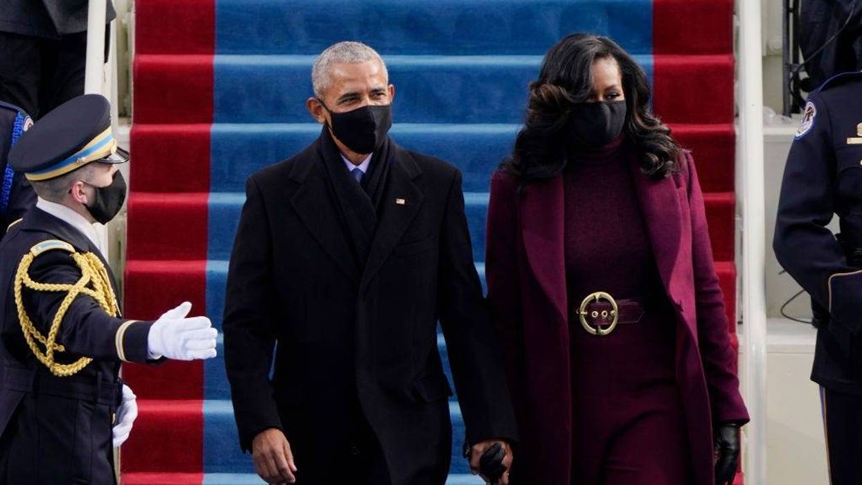 Former President Barack Obama and his wife Michelle arrive for the 59th inaugural ceremony on the West Front of the U.S. Capitol on January 20, 2021 in Washington, DC.