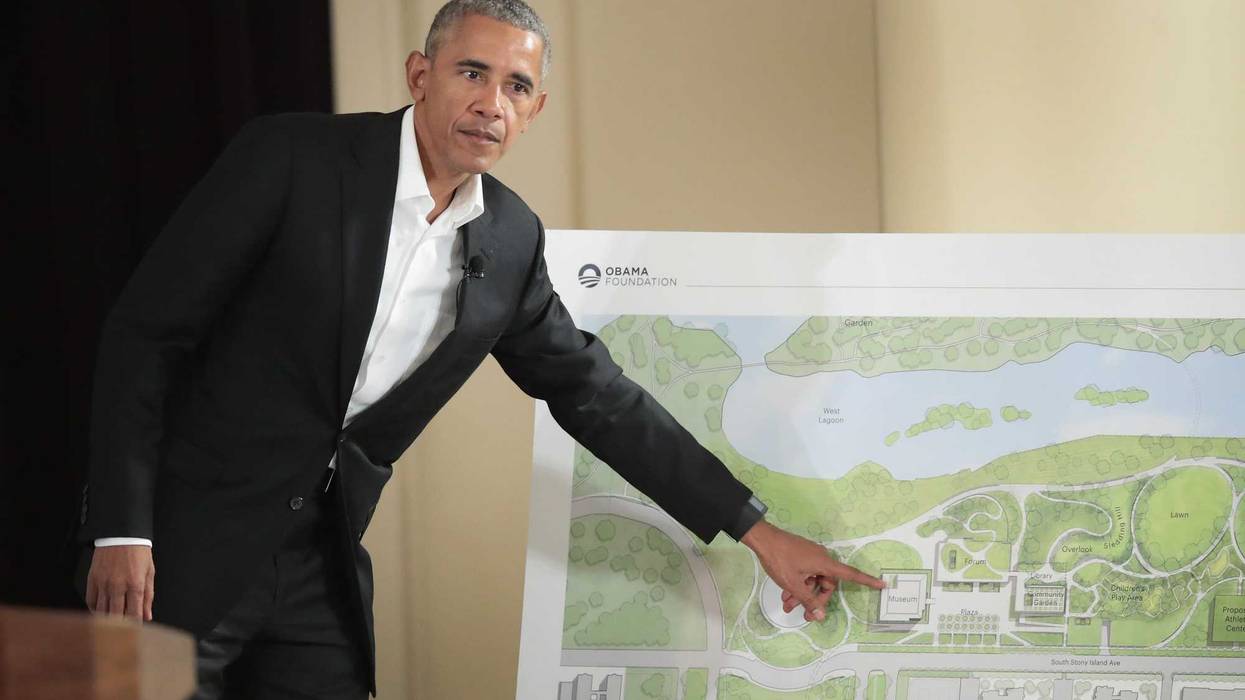 Former President Barack Obama points out features of the proposed Obama Presidential Center, which is scheduled to be built in nearby Jackson Park, during a gathering at the South Shore Cultural Center on May 3, 2017 in Chicago, Illinois. The Presidential Center design envisions three buildings, a museum, library and forum. Obama was accompanied at the event by his wife Michelle who was making her first trip back to Chicago since leaving the White House in January.