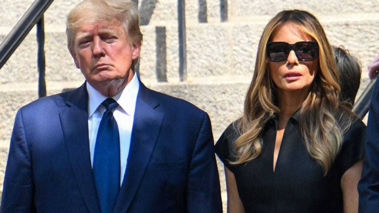 Former President Donald J. Trump and Melania Trump exit the funeral of Ivana Trump at St. Vincent Ferrer Roman Catholic Church July 20, 2022 in New York City.