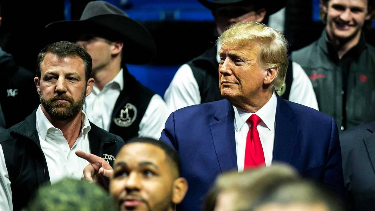 Former President Donald Trump gets off his plane after landing at the Waco Regional Airport for his Make America Great Again Rally in Waco, Texas, March 25, 2023.