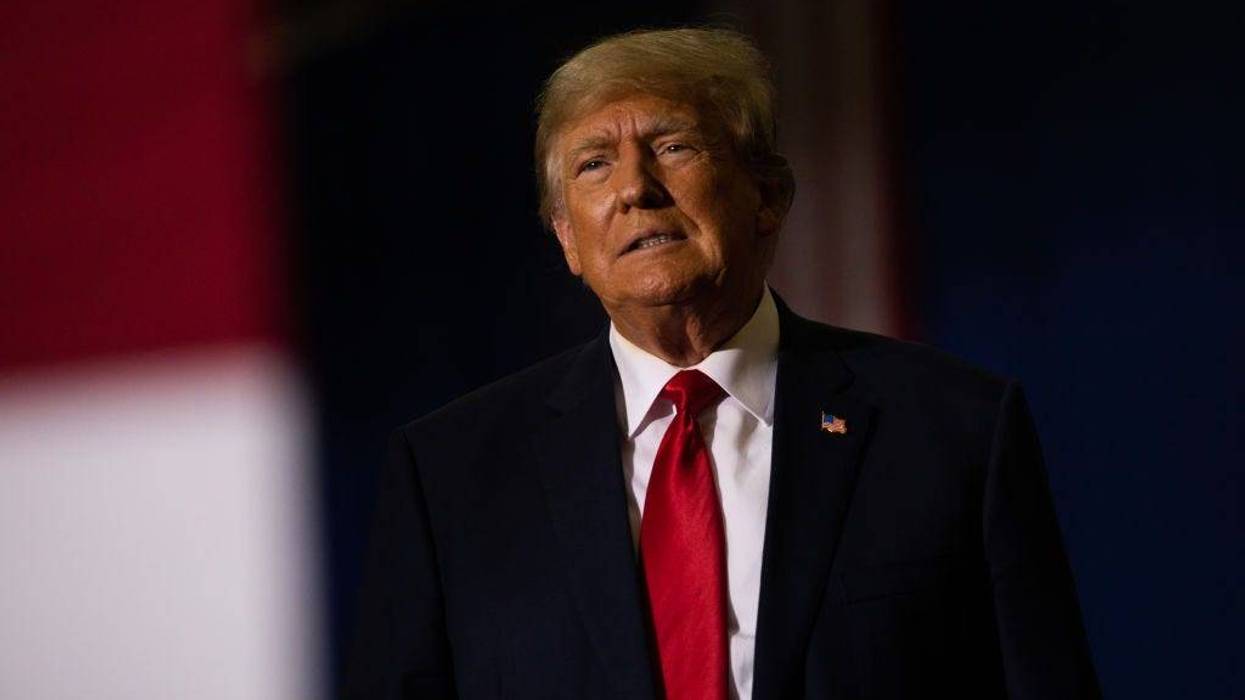 Former President Donald Trump gets ready to speak during a Save America rally on October 1, 2022 in Warren, Michigan.