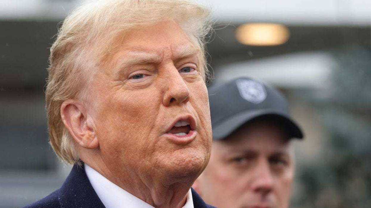 Former President Donald Trump gives a brief statement after attending the wake for slain NYPD Officer Jonathan Diller at the Massapequa Funeral Home on March 28, 2024 in Massapequa, New York.