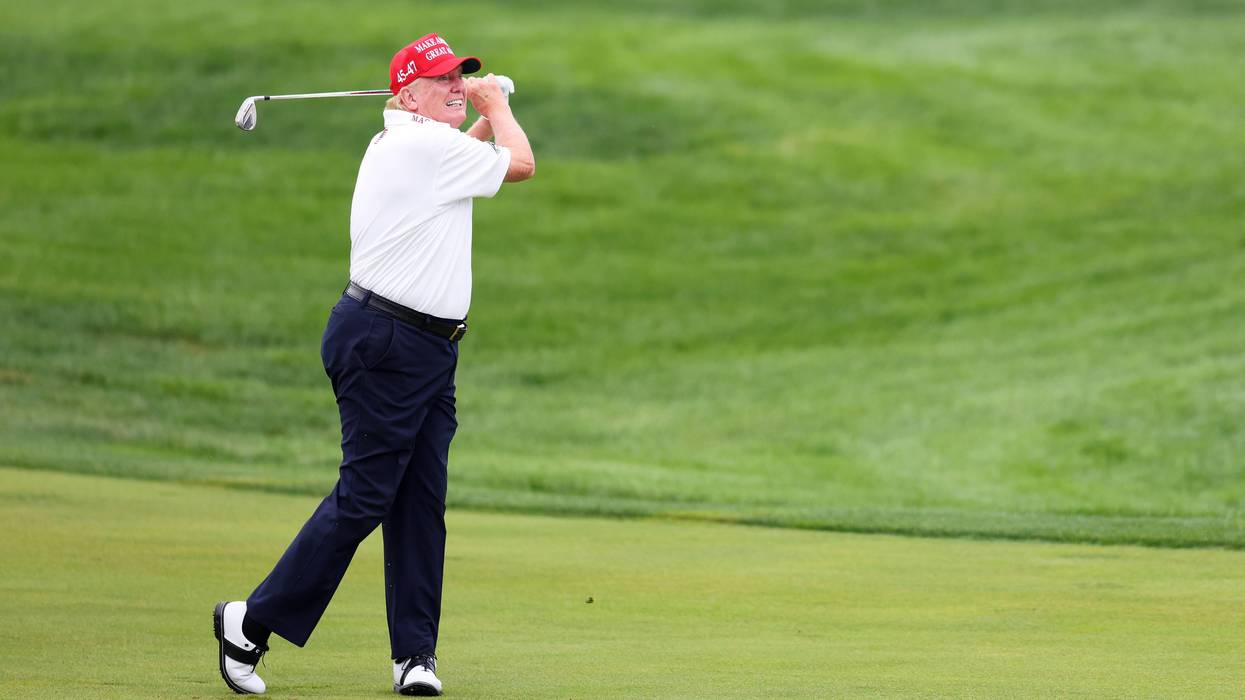 Former President Donald Trump hits his shot from the first fairway during the pro-am prior to the LIV Golf Invitational - Bedminster at Trump National Golf Club on August 10, 2023 in Bedminster, New Jersey.
