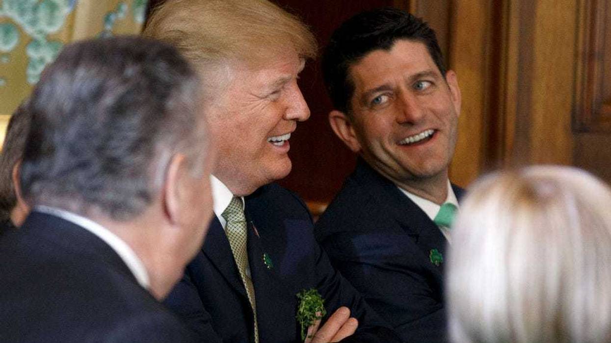 Former President Donald Trump laughs with Speaker of the House Paul Ryan at the Capitol in March 2018.