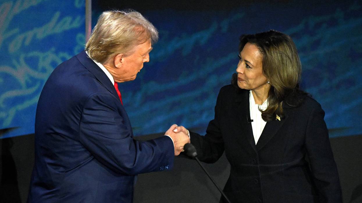 Former President Donald Trump (left) and Vice President Kamala Harris (right) shake hands at the presidential debate.