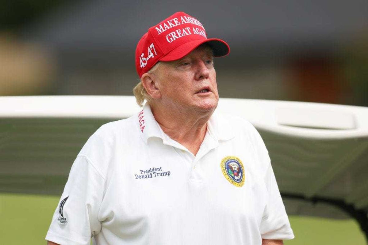 Former President Donald Trump looks on during the pro-am prior to the LIV Golf Invitational - Bedminster at Trump National Golf Club on August 10, 2023 in Bedminster, New Jersey. (Photo by Mike Stobe/Getty Images)