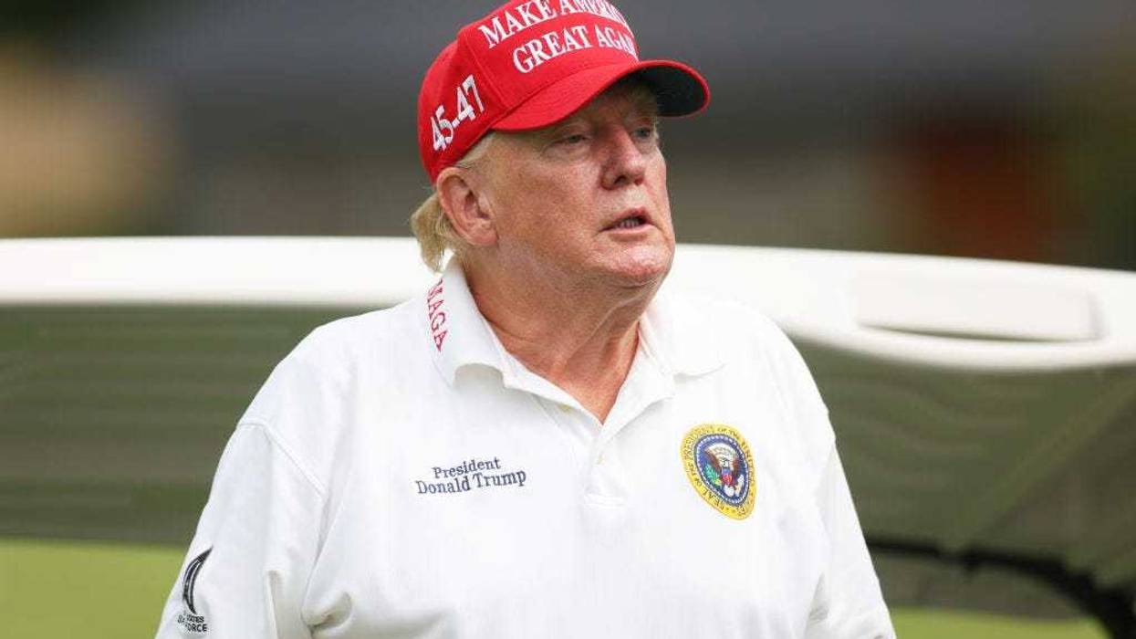 Former President Donald Trump looks on during the pro-am prior to the LIV Golf Invitational - Bedminster at Trump National Golf Club on August 10, 2023 in Bedminster, New Jersey. (Photo by Mike Stobe/Getty Images)