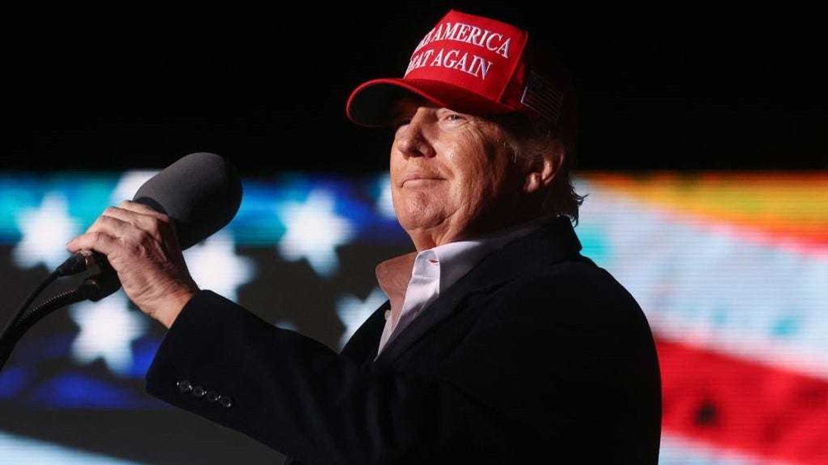 Former President Donald Trump prepares to speak at a rally at the Canyon Moon Ranch festival grounds on January 15, 2022 in Florence, Arizona.