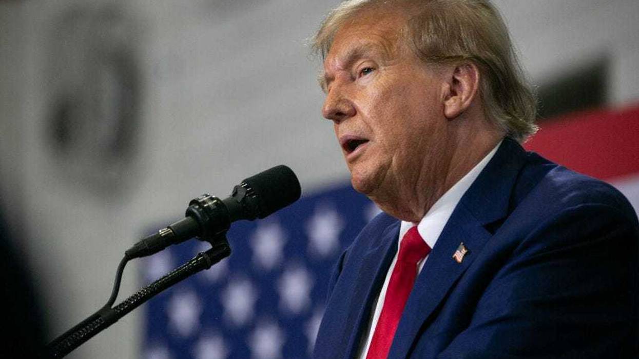 Former President Donald Trump speaks to a crowd of supporters at the Fort Dodge Senior High School on November 18, 2023 in Fort Dodge, Iowa.