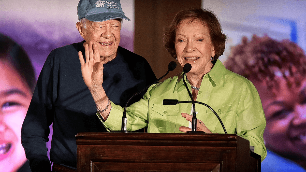 Former President Jimmy Carter and First Lady Rosalynn Carter talk to Habitat For Humanity volunteers and community leaders during a launch party for the Carter Work Project at the Peabody Hotel in Memphis Aug. 21, 2016.