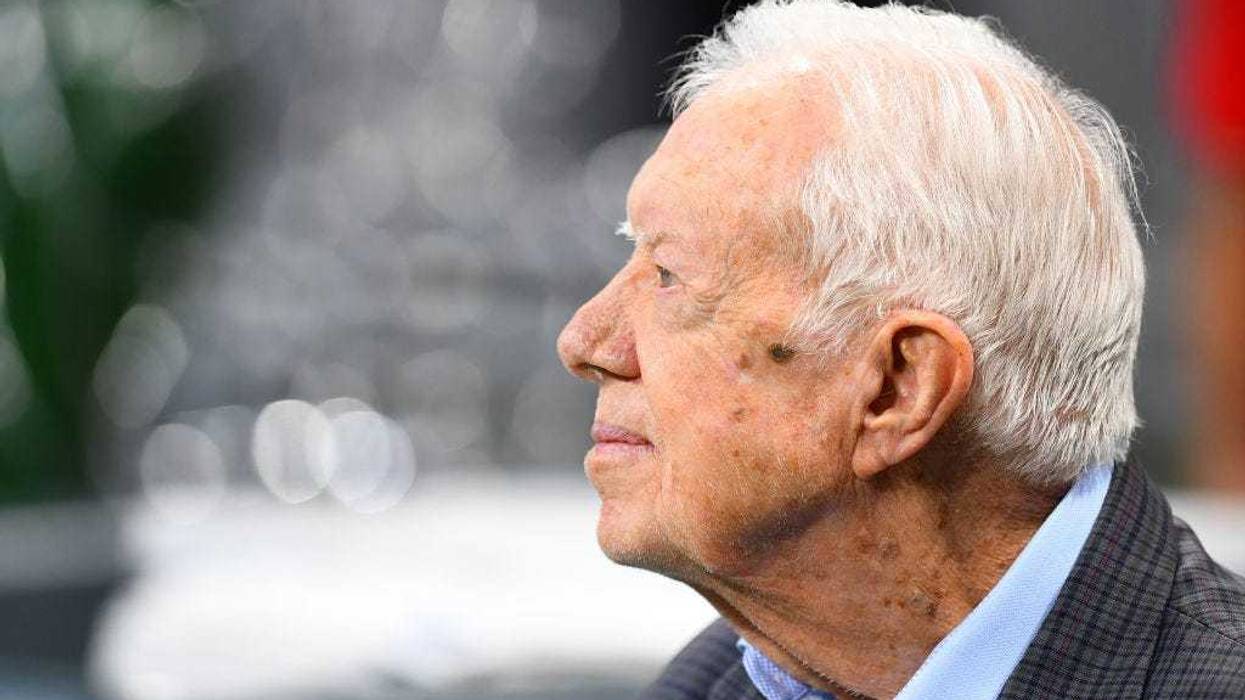 Former president Jimmy Carter prior to the game between the Atlanta Falcons and the Cincinnati Bengals at Mercedes-Benz Stadium on September 30, 2018 in Atlanta, Georgia.
