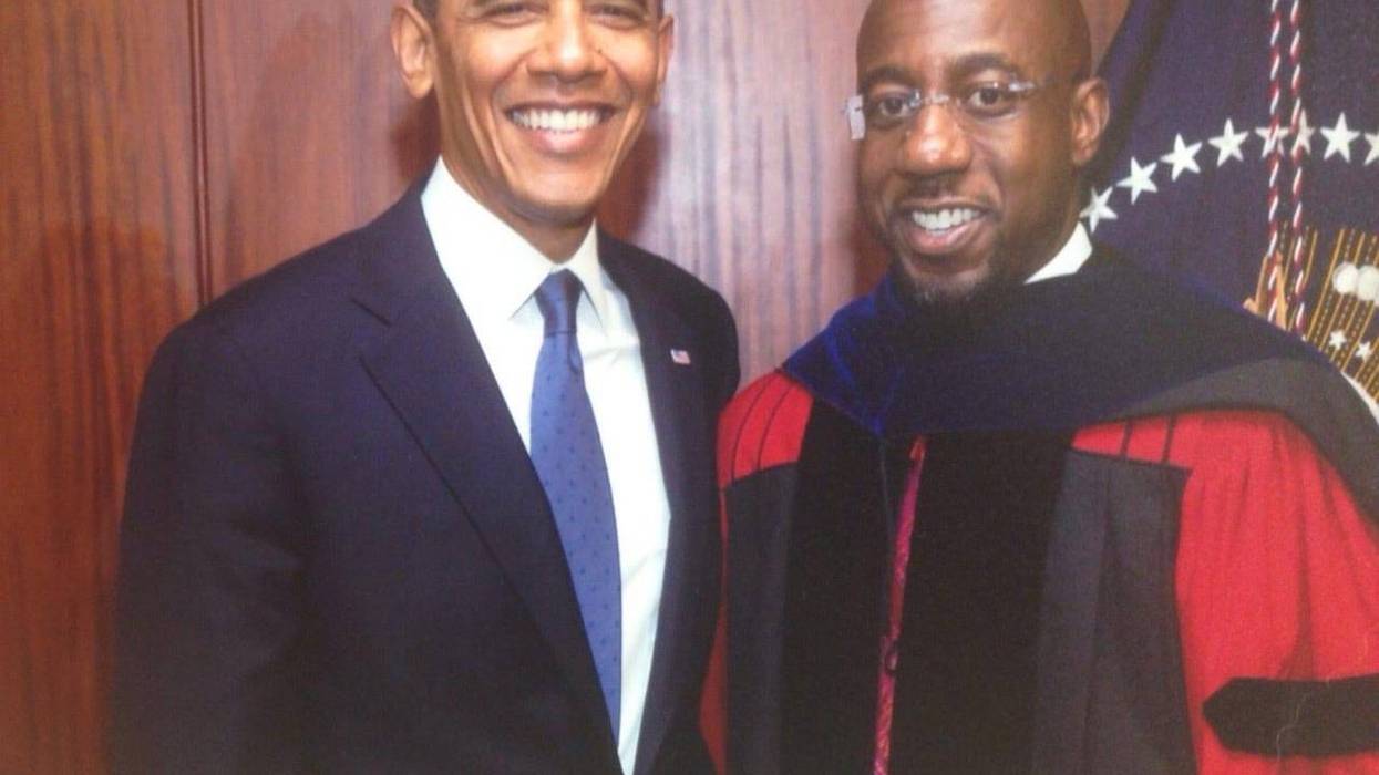 Former President Obama is shown in a photo with candidate for U.S. Senate Dr Raphael Warnock