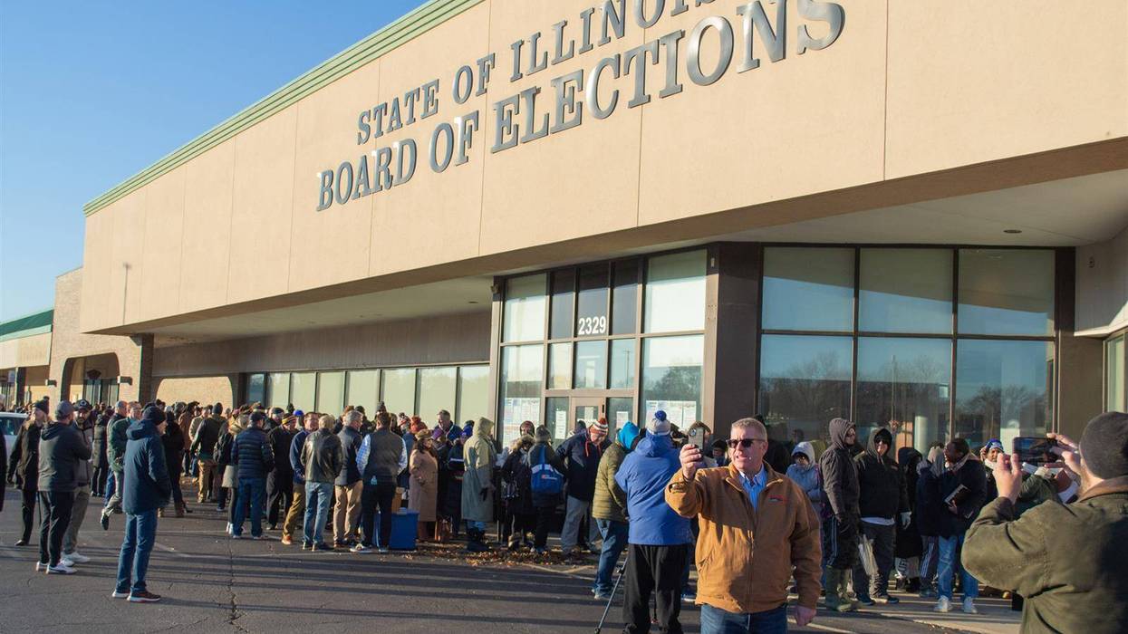 Former state Sen. Darren Bailey, who ran unsuccessfully for governor in 2022 and is a 2024 GOP candidate for Congress, records a video from the Illinois State Board of Elections building in Springfield on Nov. 27. Candidates wishing to be in a lottery to appear first on the ballot in the 2024 primary election had to be in line by 8 a.m. Monday.