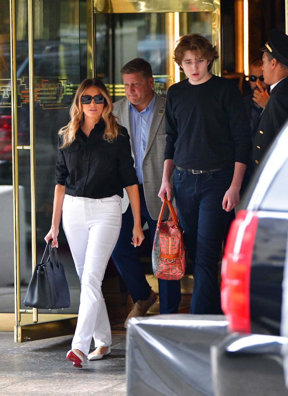 Former U.S. First Lady Melania Trump and son Barron Trump leave Trump Tower in Manhattan on July 07, 2021 in New York City.