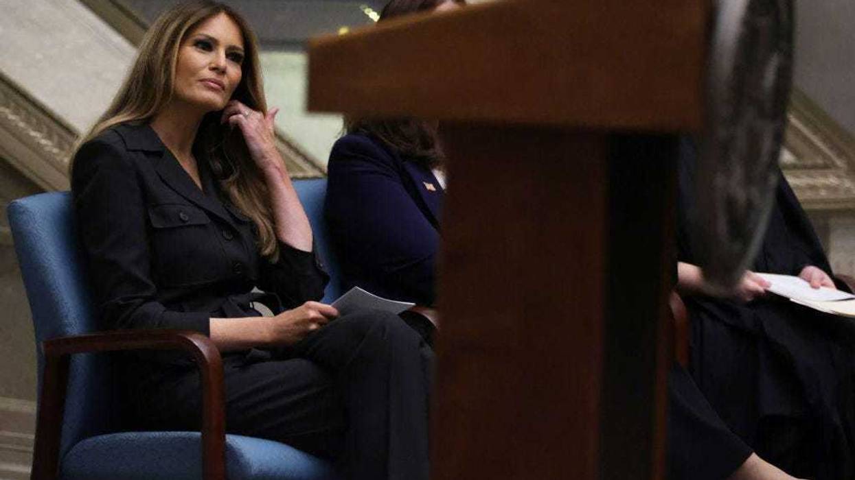 Former U.S. first lady Melania Trump waits to be introduced during a naturalization ceremony at the National Archives on December 15, 2023 in Washington, DC.