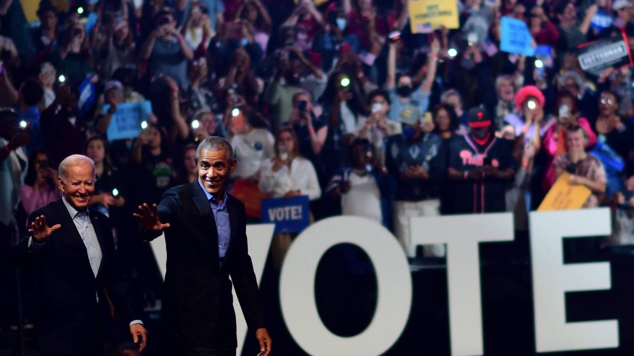 Former U.S. President Barack Obama and President Joe Biden wave to supporters during a rally for Pennsylvania Democratic Senate nominee John Fetterman and Democratic gubernatorial nominee Josh Shapiro at the Liacouras Center on November 5, 2022 in Philadelphia, Pennsylvania. Fetterman will face Republican nominee Dr. Mehmet Oz as Shapiro faces Republican Doug Mastriano on November 8 in the midterm general election.