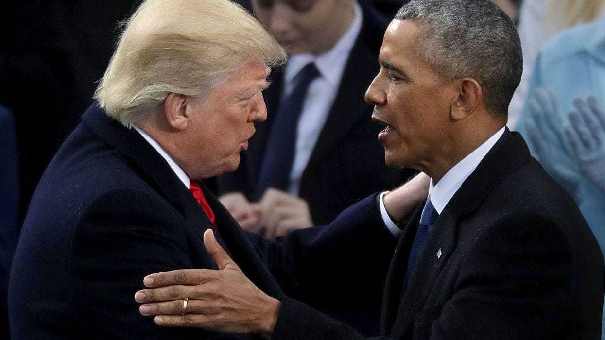 Former U.S. President Barack Obama (R) congratulates U.S. President Donald Trump after he took the oath of office on the West Front of the U.S. Capitol on January 20, 2017 in Washington, DC.