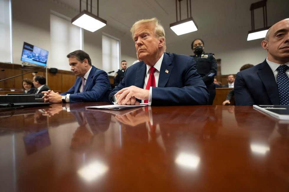 Former U.S. President Donald Trump and attorneys Todd Blanche and Emil Bove attend his trial for allegedly covering up hush money payments at Manhattan Criminal Court on May 16, 2024 in New York City.