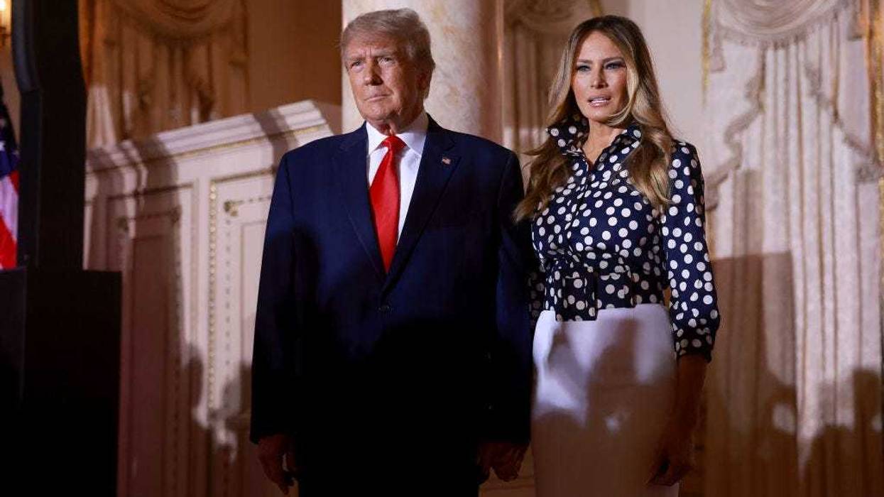 Former U.S. President Donald Trump and former first lady Melania Trump arrive for an event at his Mar-a-Lago home on November 15, 2022 in Palm Beach, Florida.