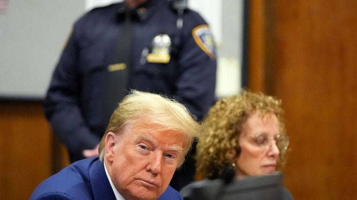 Former U.S. President Donald Trump appears with his lawyer Susan Necheles for a pre-trial hearing in a hush money case in criminal court on March 25, 2024 in New York City.