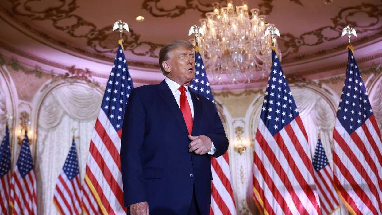Former U.S. President Donald Trump arrives on stage to speak during an event at his Mar-a-Lago home