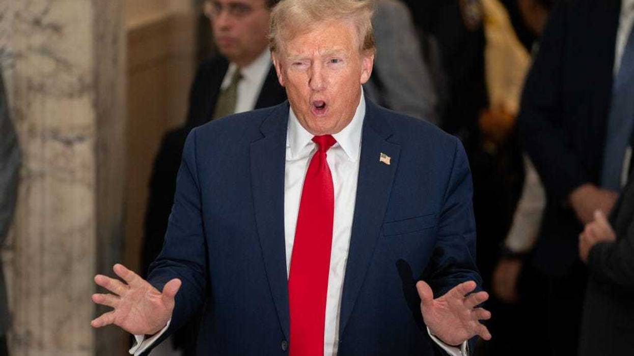Former U.S. President Donald Trump departs for lunch and speaks to the media during his trial in New York State Supreme Court on December 7, 2023 in New York City. Trump's civil fraud trial alleges that he and his two sons Donald Trump Jr. and Eric Trump conspired to inflate his net worth on financial statements provided to banks and insurers to secure loans. New York Attorney General Letitia James has sued seeking $250 damages. (Photo by David Dee Delgado/Getty Images)