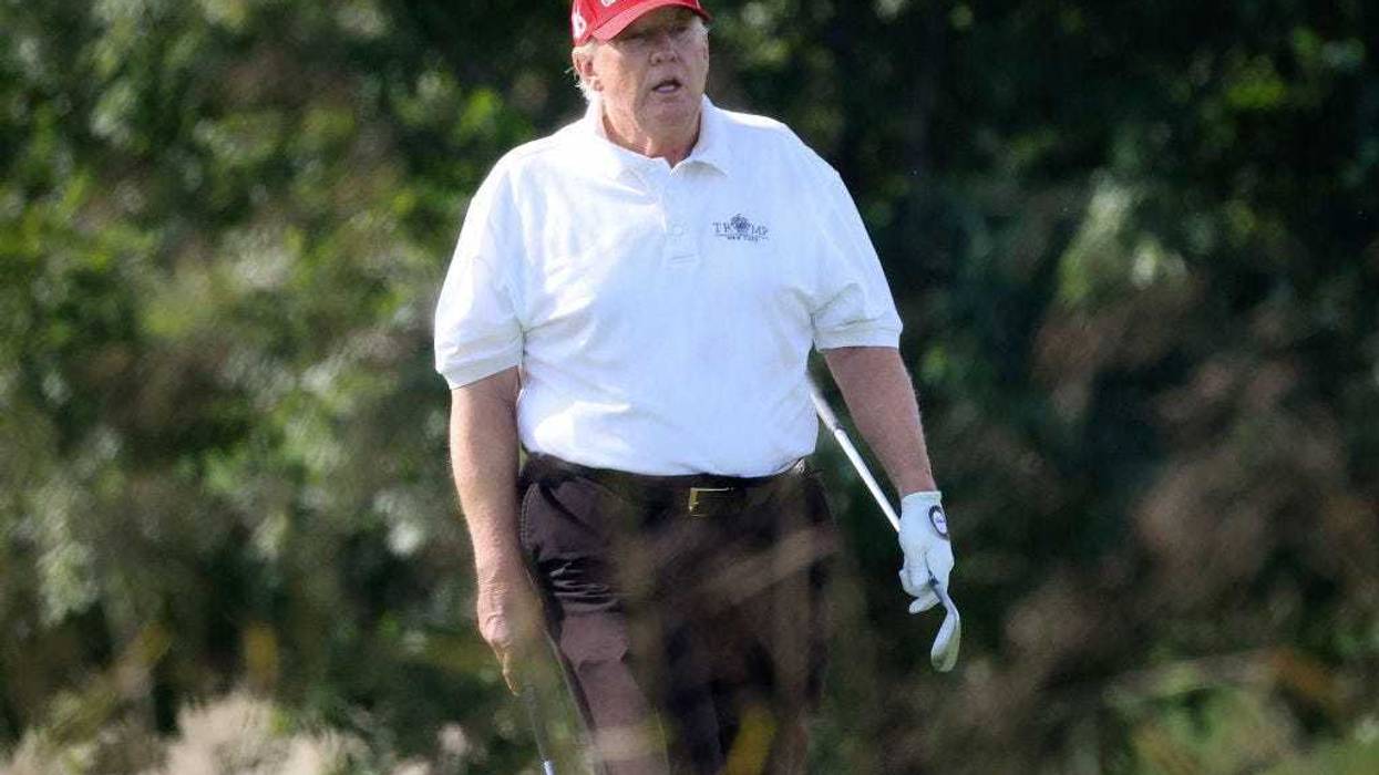 Former U.S. President Donald Trump golfs at Trump National Golf Club September 13, 2022 in Sterling, Virginia.