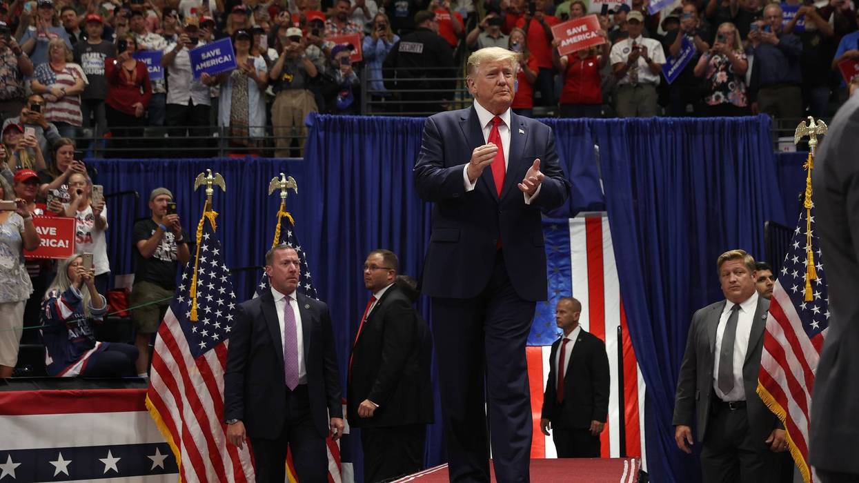 Former U.S. President Donald Trump greets supporters during a "Save America" rally at Alaska Airlines Center on July 09, 2022 in Anchorage, Alaska.