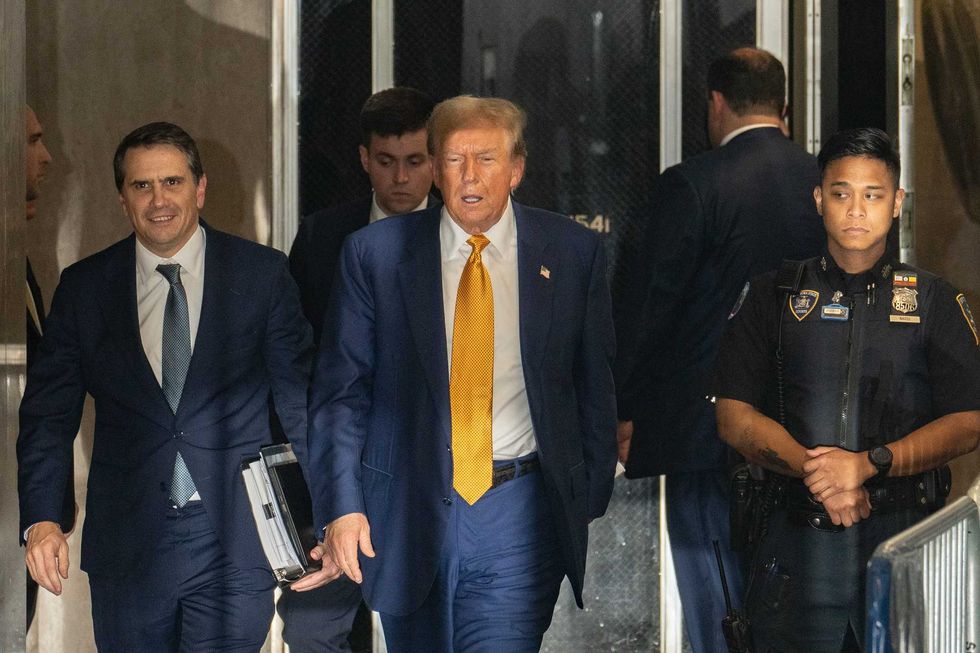 Former U.S. President Donald Trump leaves court during his trial for allegedly covering up hush money payments at Manhattan Criminal Court on May 2, 2024 in New York City. Former U.S. President Donald Trump faces 34 felony counts of falsifying business records in the first of his criminal cases to go to trial.