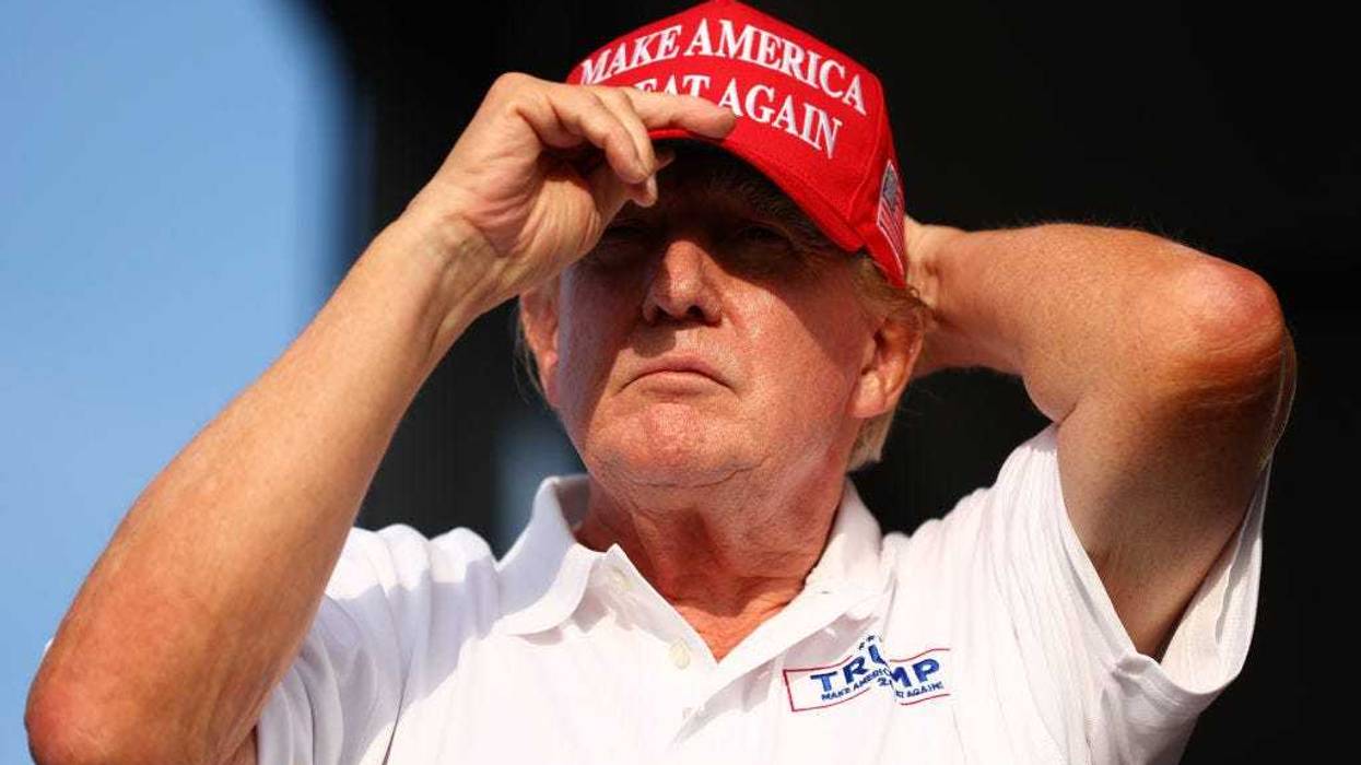 Former U.S. President Donald Trump looks on at the 18th green during day three of the LIV Golf Invitational - Miami at Trump National Doral Miami on April 07, 2024 in Doral, Florida. (Photo by Megan Briggs/Getty Images)