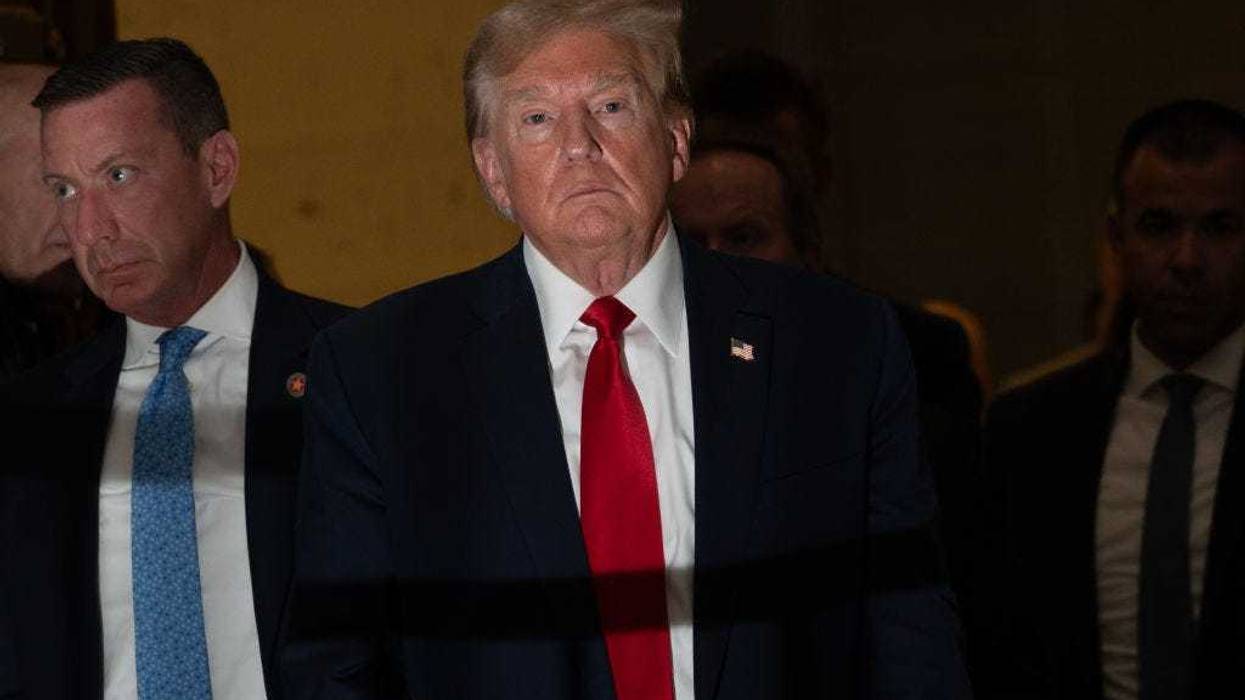 Former U.S. President Donald Trump returns from a court recess and speaks to the media during his trial in New York State Supreme Court on December 7, 2023 in New York City. Trump's civil fraud trial alleges that he and his two sons Donald Trump Jr. and Eric Trump conspired to inflate his net worth on financial statements provided to banks and insurers to secure loans. New York Attorney General Letitia James has sued seeking $250 million in damages. (Photo by David Dee Delgado/Getty Images)
