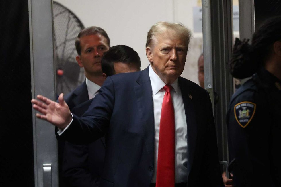 Former U.S. President Donald Trump returns to the courtroom following a lunch break for his criminal trial at Manhattan Criminal Court on May 28, 2024 in New York City. Closing arguments are set to begin in former U.S. President Trump