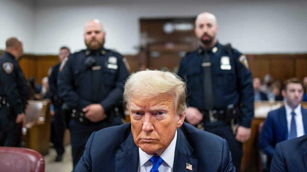 Former U.S. President Donald Trump sits at the defendant's table inside the courthouse for his hush money trial at Manhattan Criminal Court on May 30, 2024 in New York City.