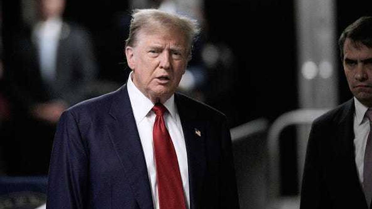 Former U.S. President Donald Trump speaks to the media as he arrives to court with attorney Todd Blanche (R) during his trial for allegedly covering up hush money payments at Manhattan Criminal Court on April 30, 2024 in New York City.
