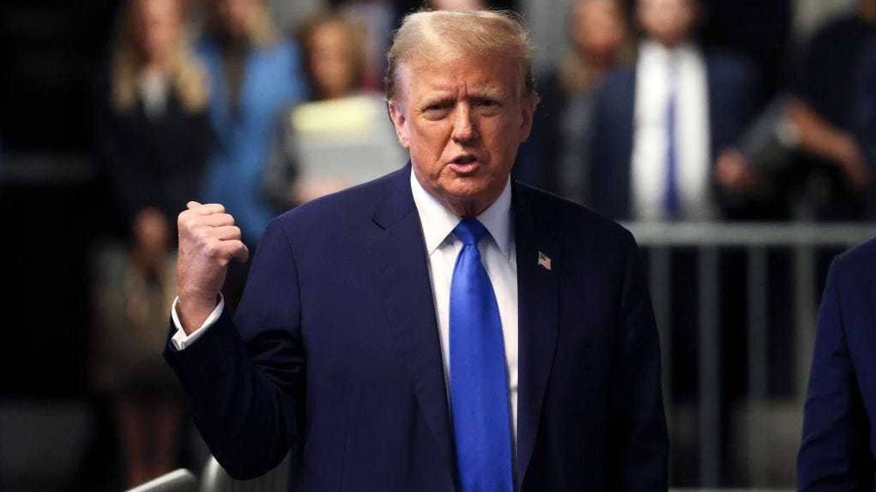 Former U.S. President Donald Trump speaks to the media as he leaves court during his trial for allegedly covering up hush money payments at Manhattan Criminal Court on April 22, 2024 in New York City.