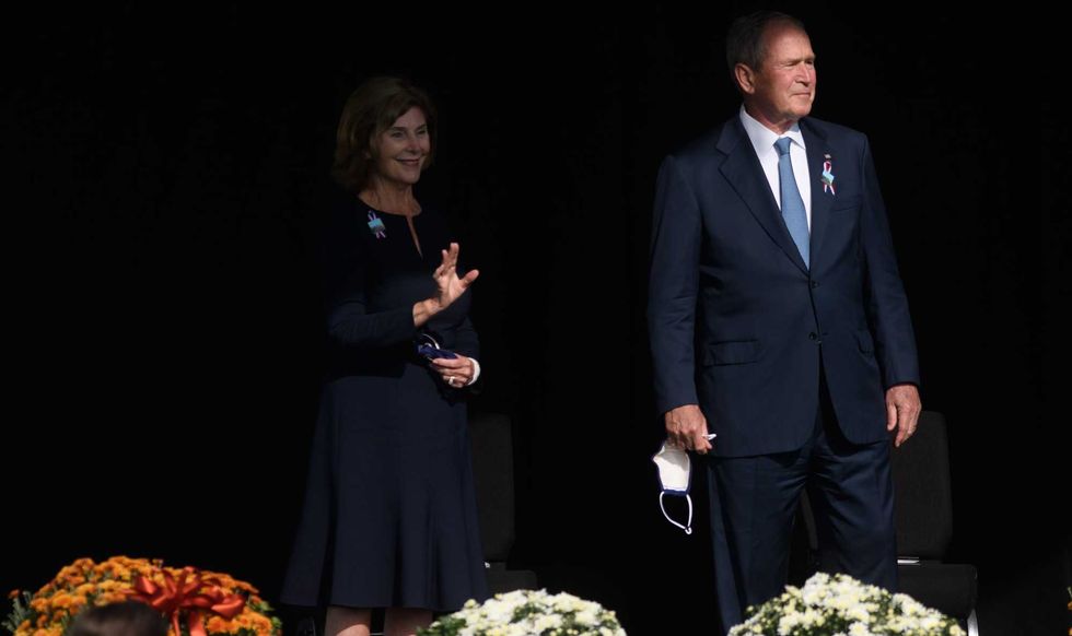 Former U.S. President George W Bush and his wife Laura attend the 20th Anniversary remembrance of the September 11, 2001 terrorist attacks at the Flight 93 National Memorial on September 11, 2021 in Shanksville, Pennsylvania