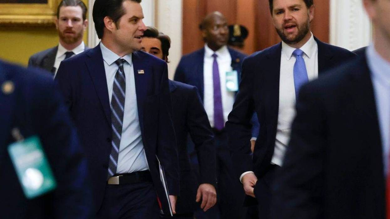 Former U.S. Rep. Matt Gaetz (R-Fla.), President-elect Donald Trump's nominee to be Attorney General, walks with Vice President-elect JD Vance as they arrive for meetings with senators at the U.S. Capitol on Wednesday.