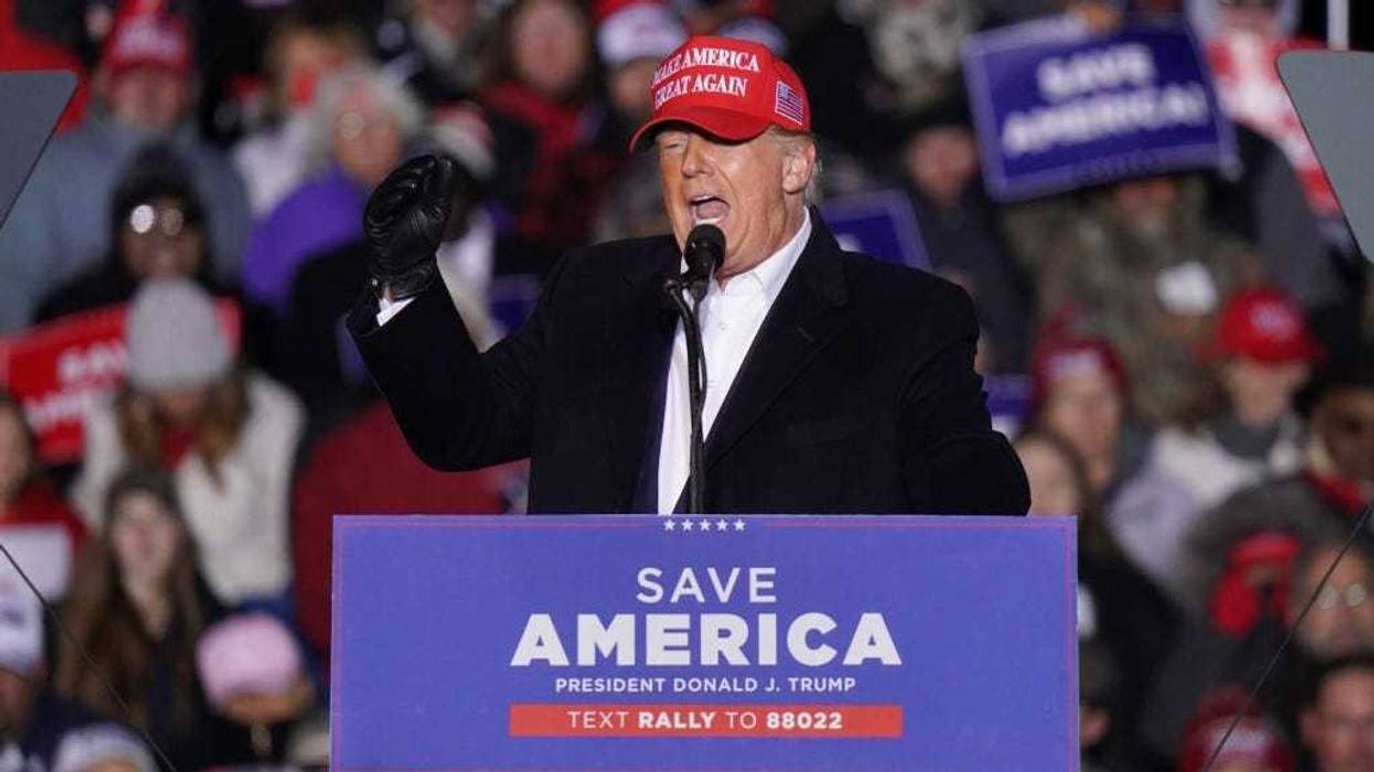 Former US President Donald Trump speaks to the crowd during a rally at the Florence Regional Airport on March 12, 2022 in Florence, South Carolina.