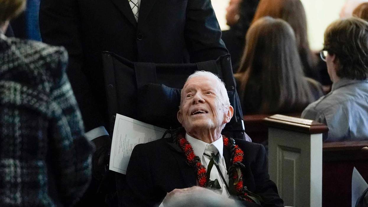Former US President Jimmy Carter departs a funeral service for former US First Lady Rosalynn Carter, at Maranatha Baptist Church in Plains, Georgia, on November 29, 2023
