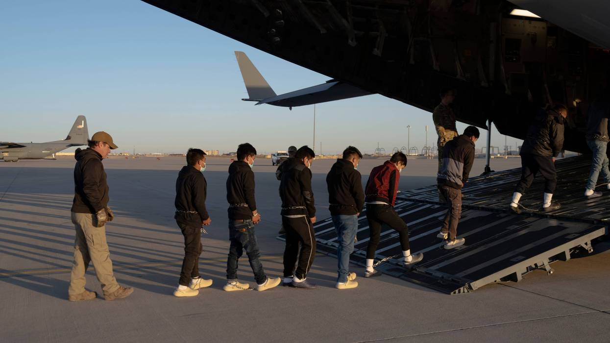 FORT BLISS, TX - JANUARY 23, 2025: (EDITOR'S NOTE: This Handout image was provided by a third-party organization and may not adhere to Getty Images' editorial policy.) In this handout provided by the U.S. Department of Defense, U.S. Customs and Border Protection security agents guide illegal immigrants onboard a C-17 Globemaster III assigned to the 60th Air Mobility Wing for a removal flight at Fort Bliss, Texas, on Jan. 23, 2025. Under the direction of U.S. Northern Command, U.S. Transportation Command is supporting Immigration and Customs Enforcement removal flights by providing military airlift. (Dept. of Defense photo by U.S. Army Sgt. 1st Class Nicholas J. De La Pena)