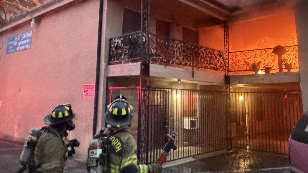 Fort Worth firefighters are battling a 3-alarm fire at a two-story apartment building on the west side of the city Tuesday morning, with multiple families displaced and one firefighter injured.