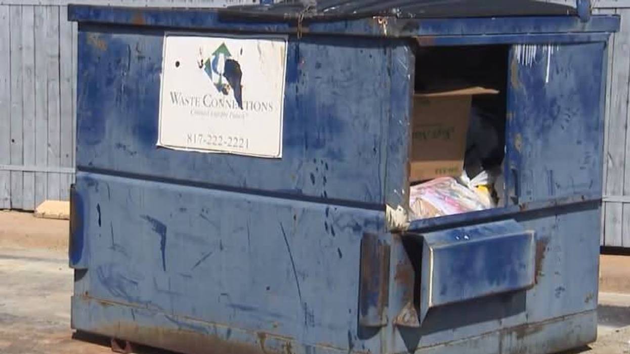 Fort Worth police have arrested two people after an infant was found dead next to a dumpster at a west-side motel Sunday night.