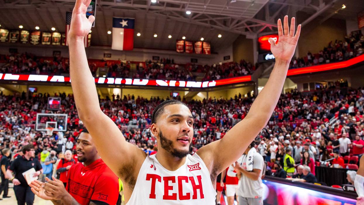 Forward Kevin Obanor #0 of the Texas Tech Red Raiders signals after the college basketball game against the Kansas Jayhawks at United Supermarkets Arena on January 08, 2022 in Lubbock, Texas.