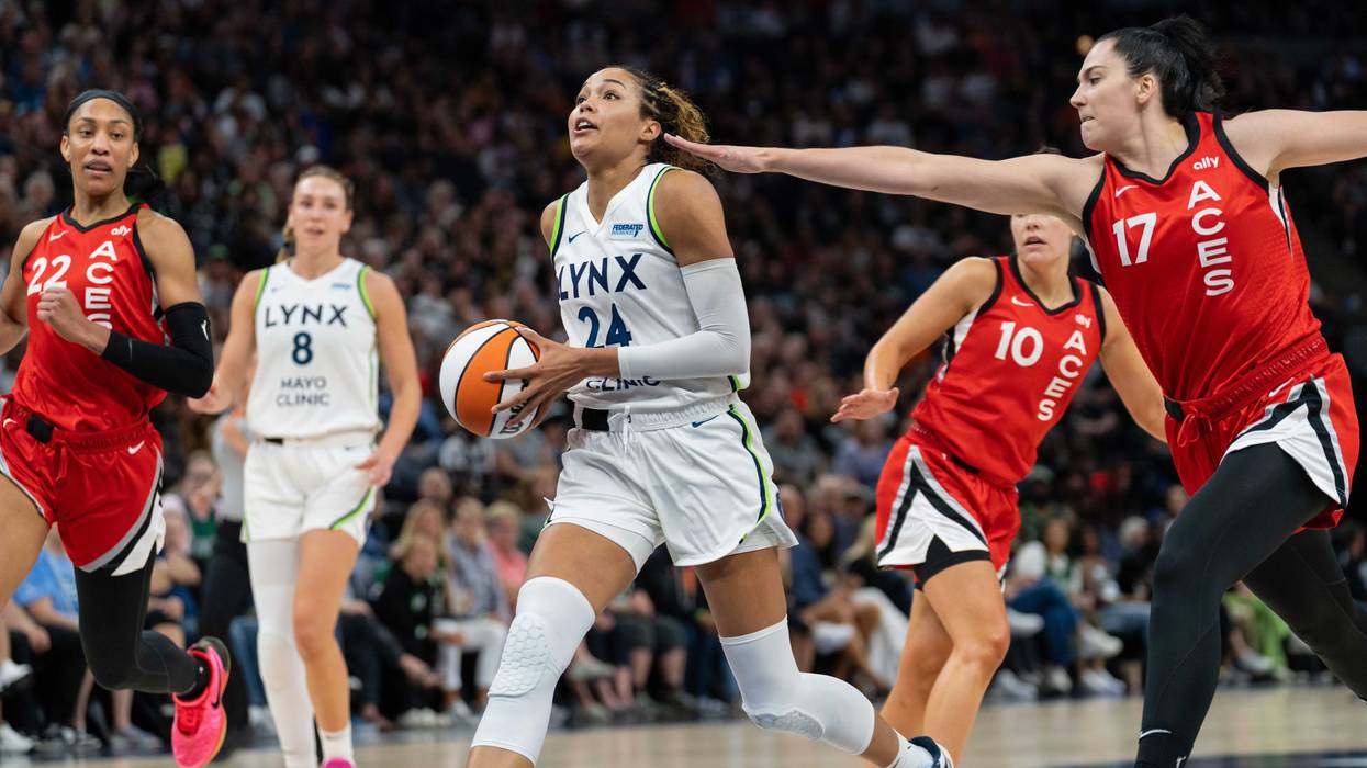 Forward Napheesa Collier #24 of the Minnesota Lynx drives to the basket past center Megan Gustafson #17 of the Las Vegas Aces at Target Center. (Photo by Ben Brewer/Getty Images)