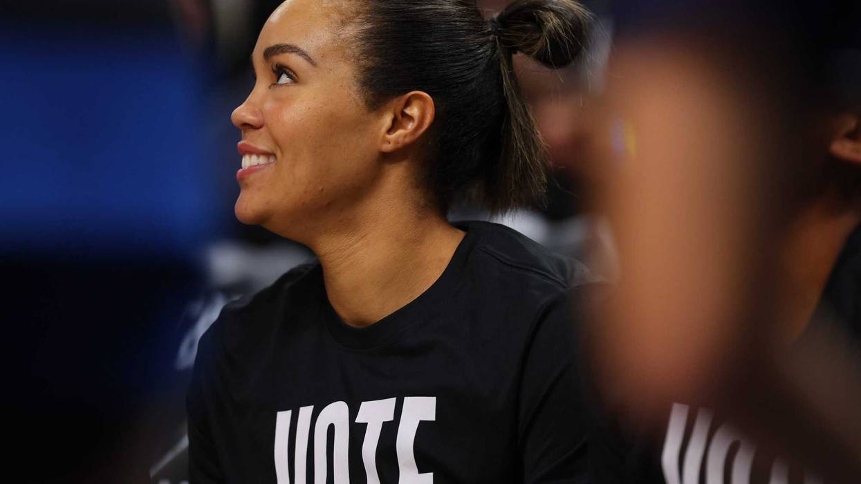 Forward Napheesa Collier #24 of the Minnesota Lynx is all smiles on the bench before the game for the Minnesota Lynx. Collier has been playing at an MVP level all year and has the Lynx at the top of the WNBA heading into the playoffs.