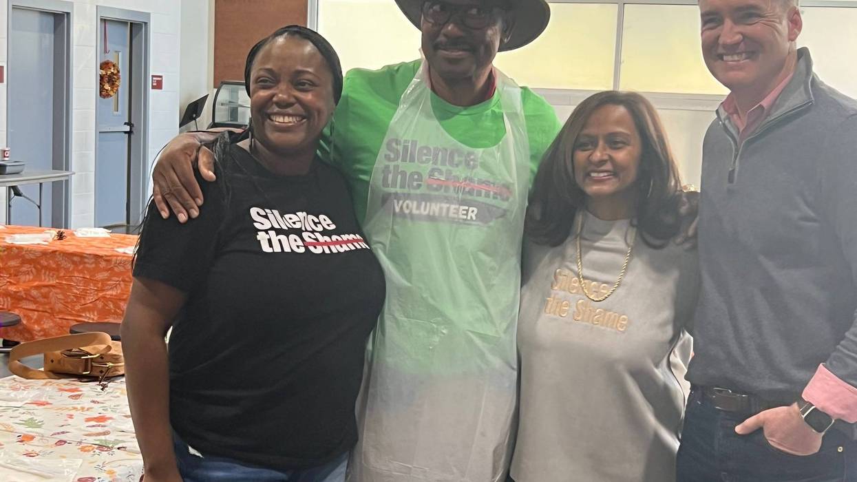 Founder of Silence the Shame, Shanti Das and CEO of the Atlanta Mission, Tensley Almand, with volunteers.