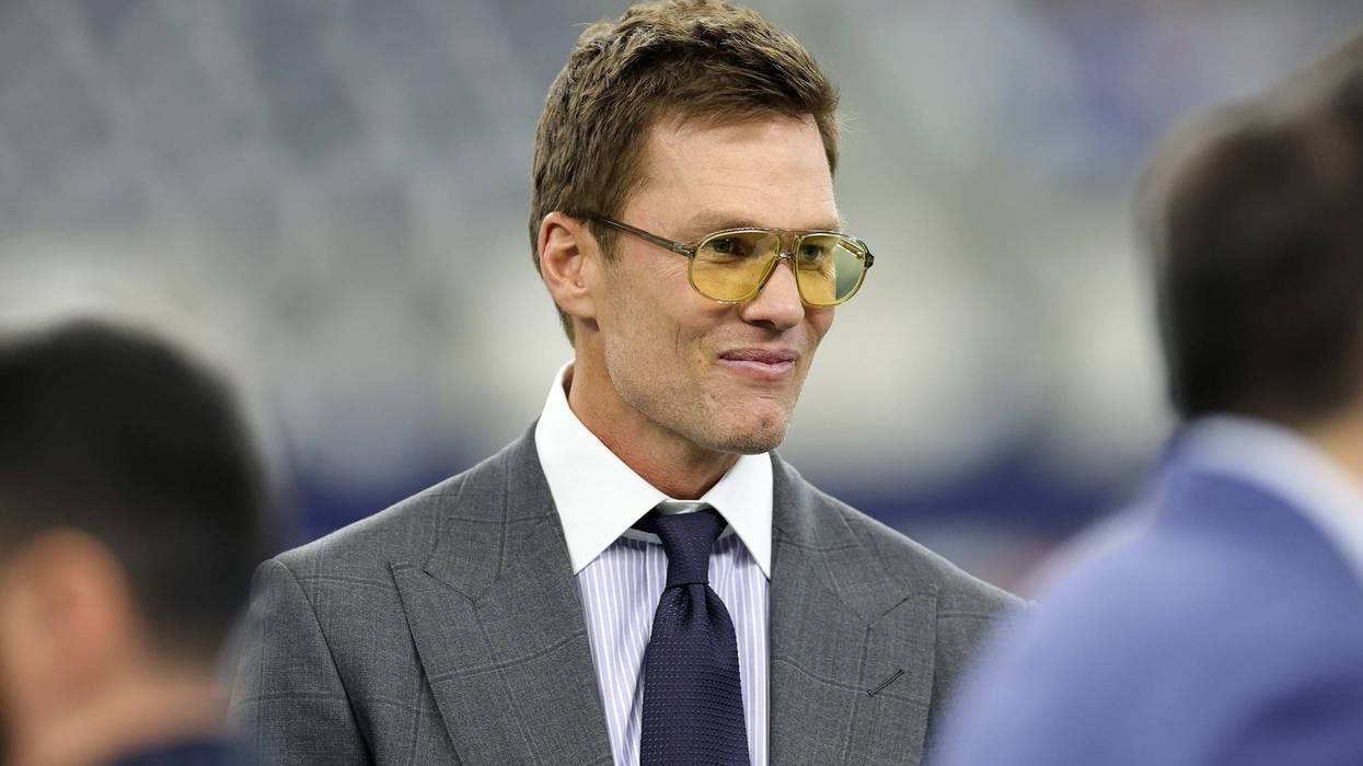 Fox sports announcer Tom Brady looks on prior to the game between the Philadelphia Eagles and Dallas Cowboys at AT&T Stadium on November 23, 2025 in Arlington, Texas.
